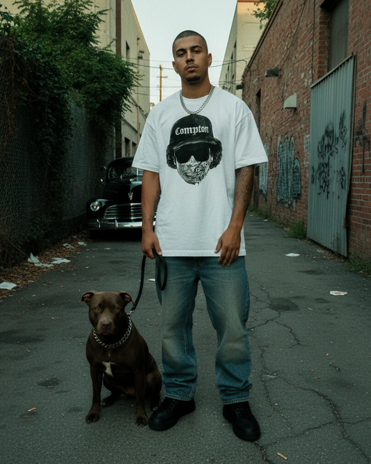 A man with a similar style, wearing a oversized t-shirt featuring a high-contrast, stylized graphic of Eazy-E